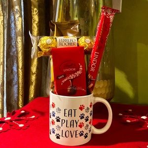 Eat, Play, Love ceramic mug set with coffee, & Lindor & Ferrero Rocher goodies.